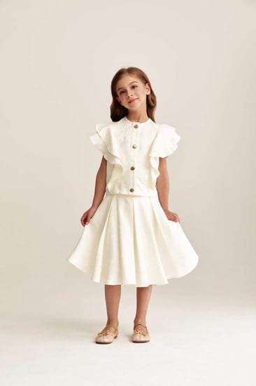 بلوزة بأكمام كشكش