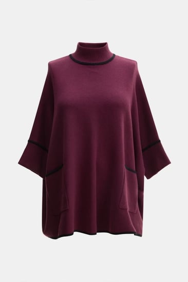 بلوزة واسعة بجيوب