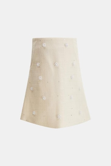 تنورة تويد مزينة باللؤلؤ والترتر