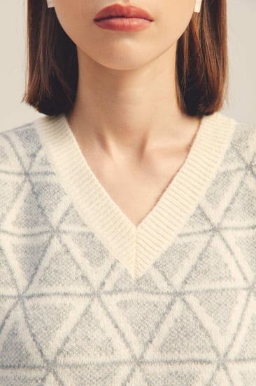 بلوزة بلا أكمـام بنقوش هندسية