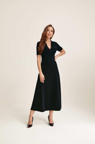 تنورة سوداء ميدي