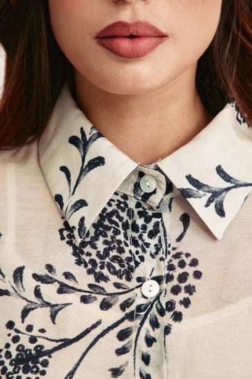 قميص مورد بقصة واسعة