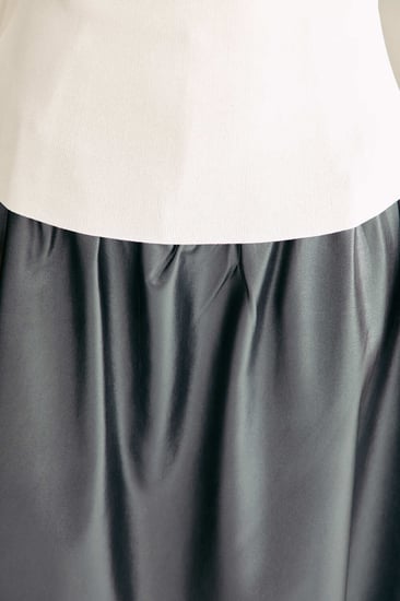 بلوزة مزينة بعقدة