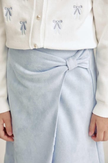 تنورة شامواة مزينة بعقدة