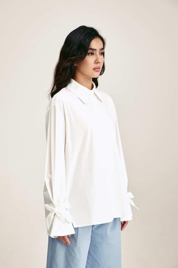 قميص واسع بأكمام بأربطة