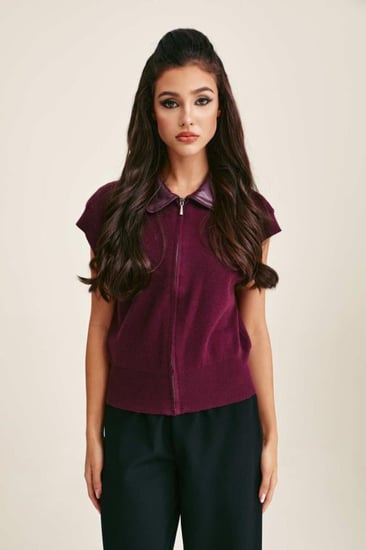 بلوزة محبوكة بياقة من الجلد