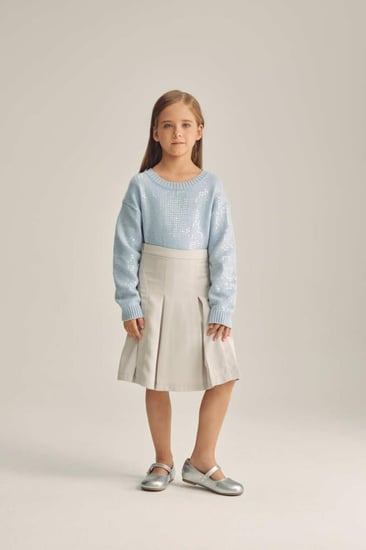 تنورة مزينة بكسرات