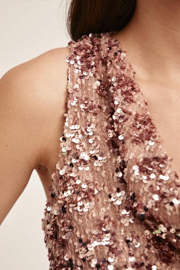 بلوزة ترتر بياقة متدلية