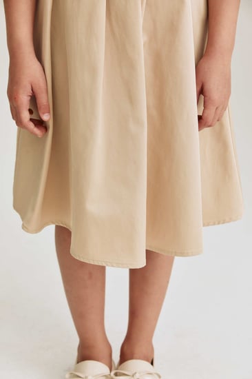 تنورة سادة بحزام