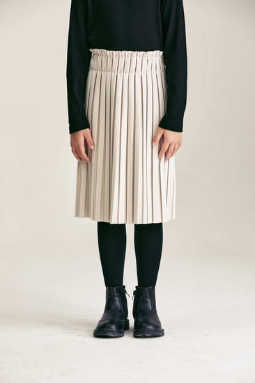 تنورة مخمل واسعة بكسرات