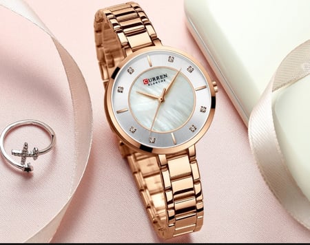 ساعة نسائية انيقة ماركة CURREN موديل 9051