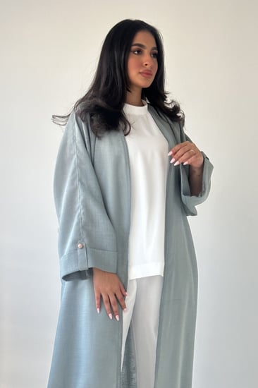 طقم من  اربع قطع باللون التركواز والابيض