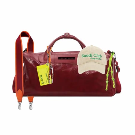 BURGEUNDY TRAVELERS BAG