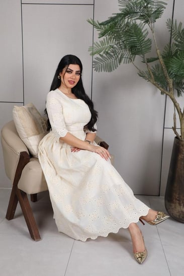 فستان ميدي انيق بقصة واسعة من تحت اللون بيج