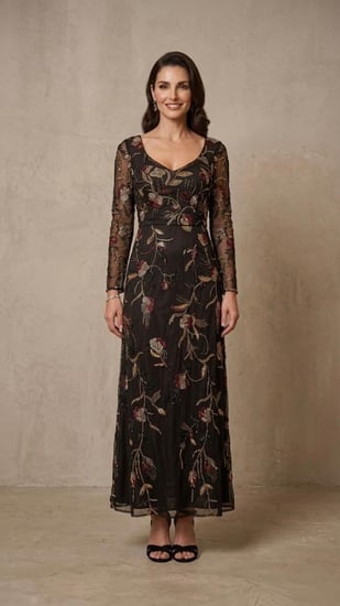 "فستان التول المطرز بالزهور" (Embroidered Floral Tulle Gown).