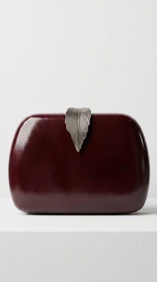 "حقيبة أوراق الغار الذهبية" (Golden Laurel Clutch)