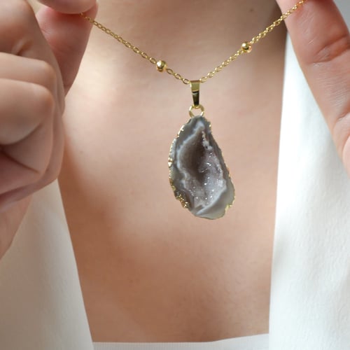 قطعة من الحجر الطبيعي ((لون اسود)) المطلي بالذهب ا...