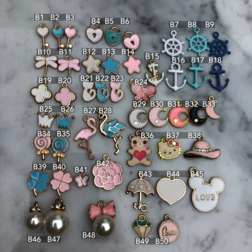 بروش الخرزه الزرقاء يمكن تغيير الفصوص مرفق صوره لل...