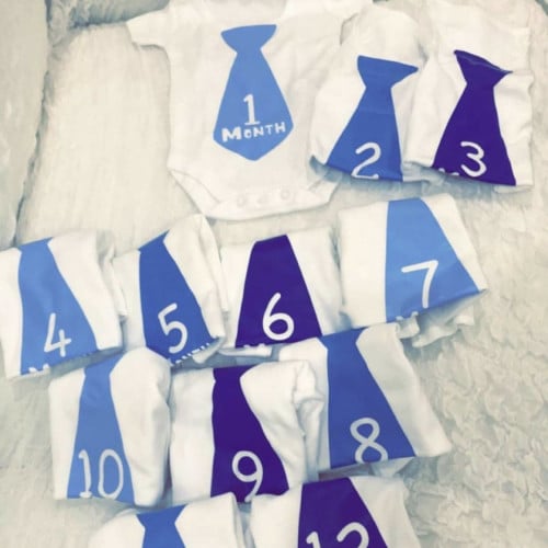 طقم بربتوزات مواليد بالأرقام أزرق