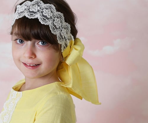 فستان اصفر صيفي بفتحة من الظهر للبنات الكبار