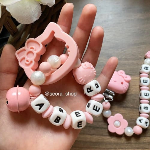 عضاضة هيلو كيتي بالاسم