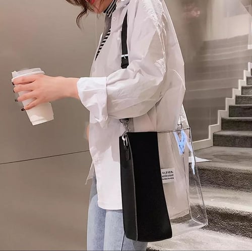 شنطه كتف / يد شفافه مع حقيه داخليه لون ابيض واسود...