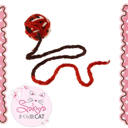 لعبة كرة الصوف مع خيط