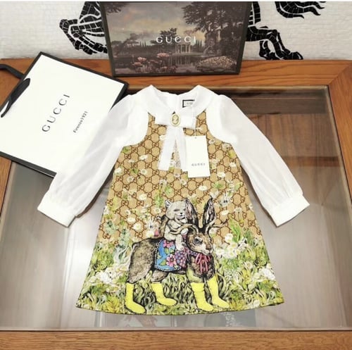 فستان قوتشي مزين ببروش