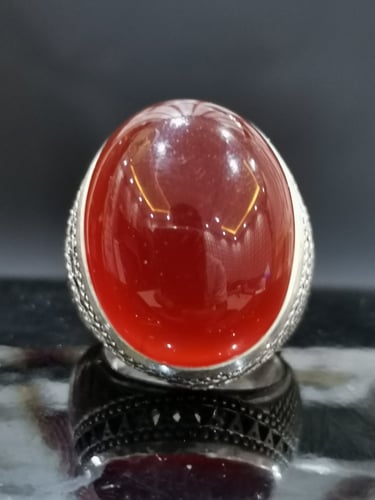 خاتم الفضة بحجر عقيق خرساني ايراني أحمر بصياغة الخ...