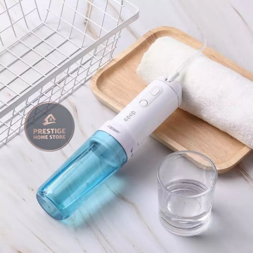 جهاز تنظيف الأسنان بضغط الماء (بني/أزرق)