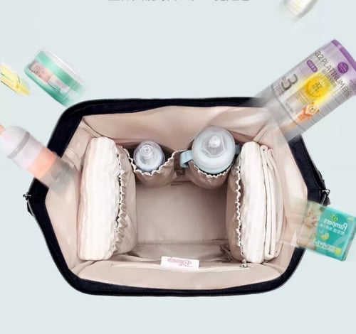 شنطة لاحتياجات الاطفال والمواليد مع سخان الرضعة وع...