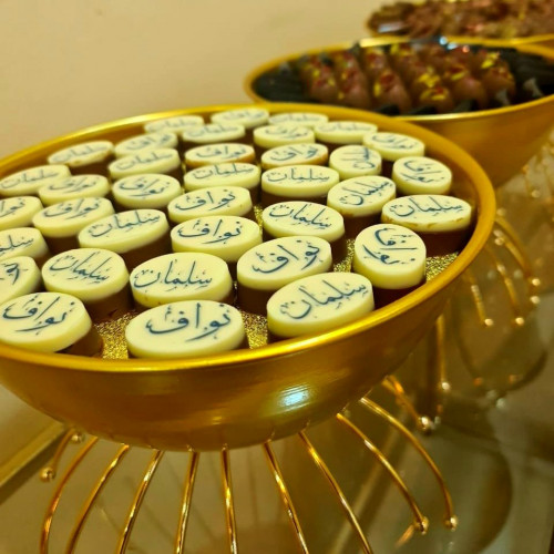 طباعة على حبات التشوكلت /بيضاوي( نص كيلو )