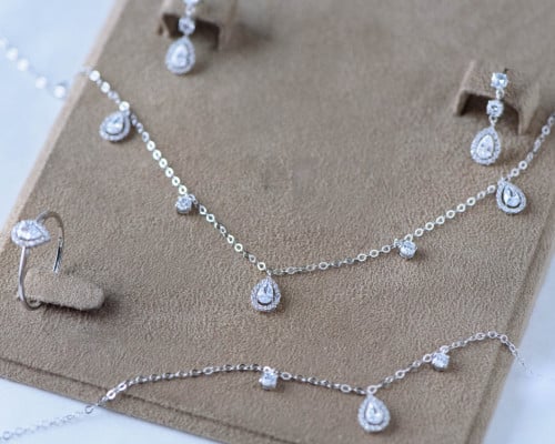 طقم كامل ذهب أبيض عيار 18