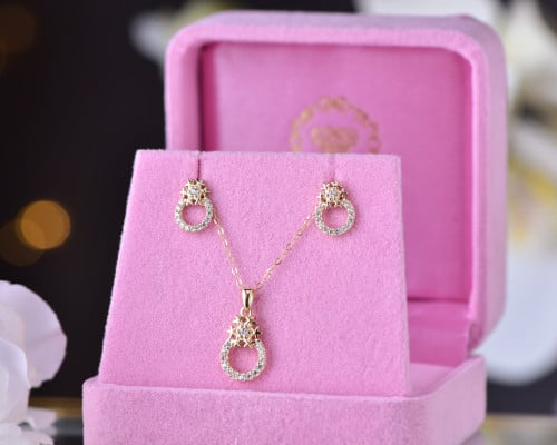 طقم أطفال ذهب عيار 18