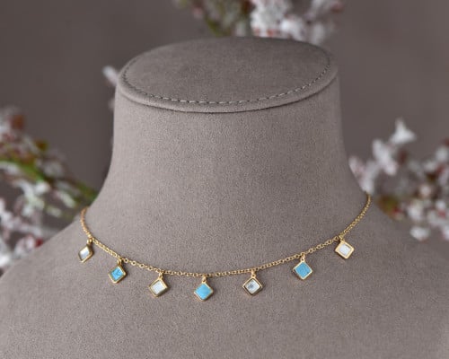 تشوكر ذهب عيار 18 محلًى بالصدف