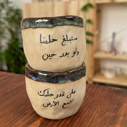 اكواب خزف بعبارات