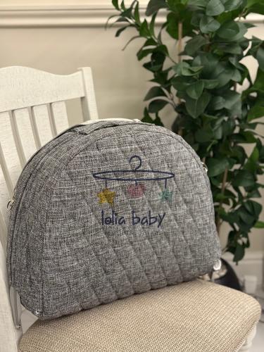 سرير متنقل رمادي ناعم مناسب للجنسين