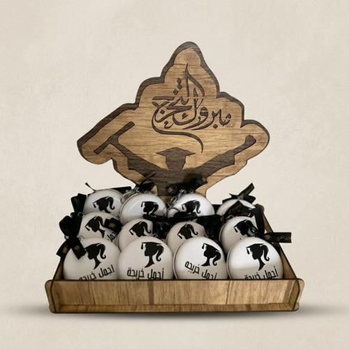 درزن (12 قطعة) مراية جلد بثيم التخرج مع تبسي خشبي