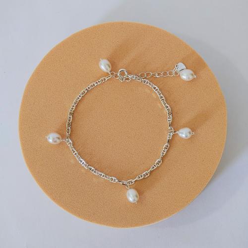 Silver bracelet and pearls comments