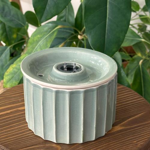 Small indoor fountain green color