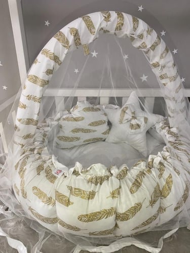 بيبي نيست الريشة الذهبية