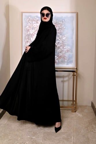 كلوش بأزرار على الأكمام