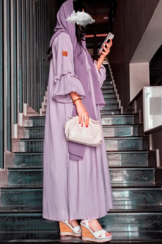 اكمام منفوخه وكسرات أمامية