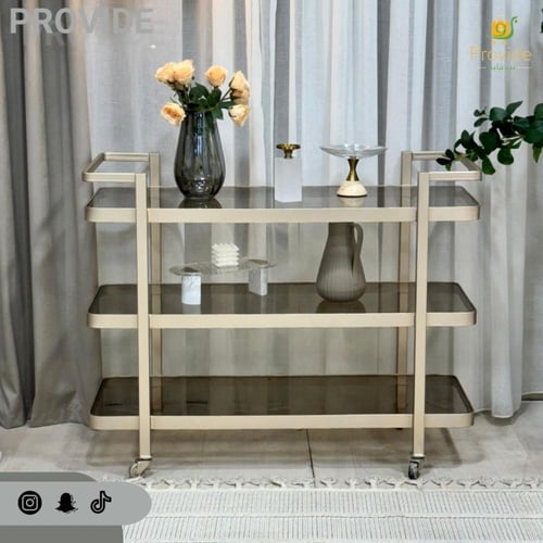 عربية تقديم بلون شمبانى ذات تصميم أنيق وعصري.