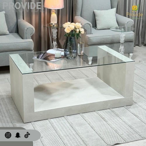 طاولة تقديم بسطح زجاجي وقاعدة من بديل الرخام