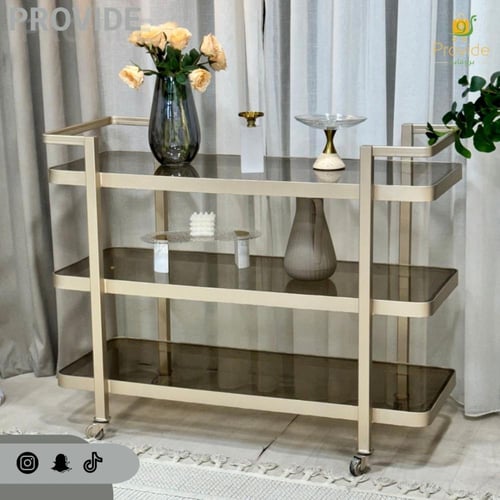عربية تقديم بلون شمبانى ذات تصميم أنيق وعصري.