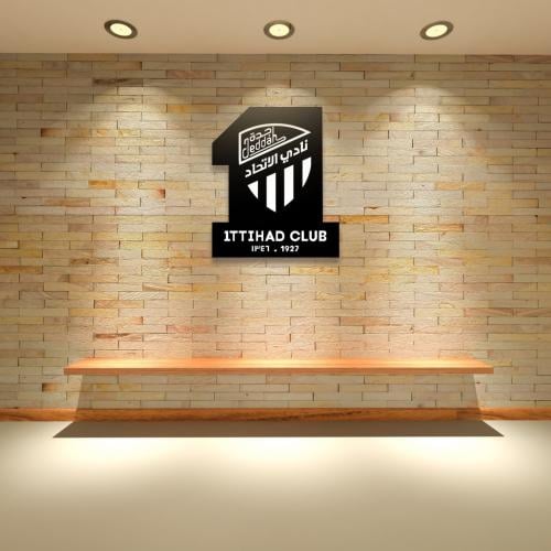 Metallic plaque with the logo of Al Ittihad Club