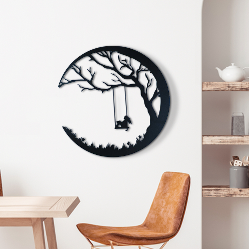 A wall art metal panel in the shape of the Tree of Life