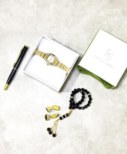 طقم ذهبي أسود 4 قطع مواليد الى 5 سنوات