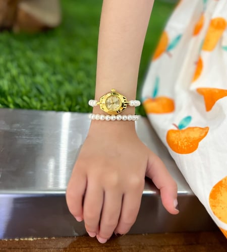 ساعة مواليد لؤلؤ مع سوار 0-5سنوات